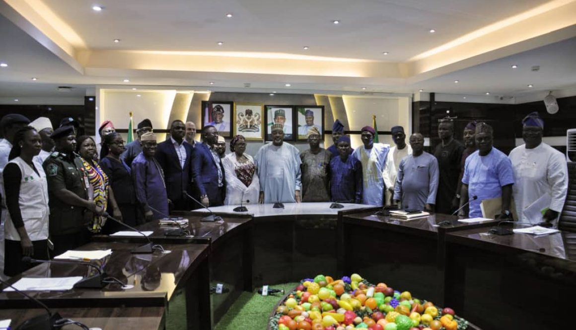 Minister of Agriculture and Food Security, Sen Abubakar Kyari (C),and Members of the National Taskforce during the inauguration.